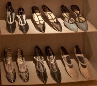 A photo of a shelf with shoes