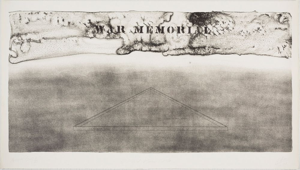 A black and white picture. In the upper part it says ‘War Memorial’. In the lower part you can see a triangle.