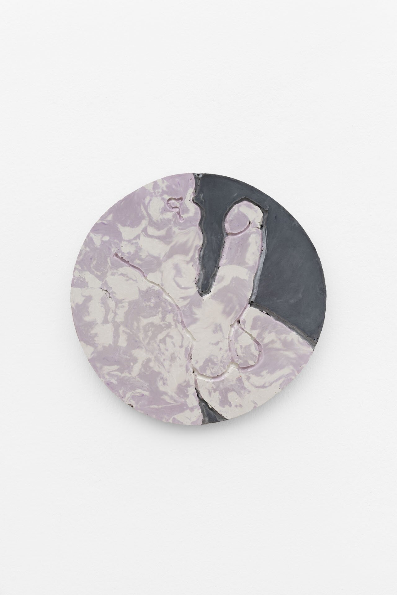 Round disk in marble look with the image of an erect phallus