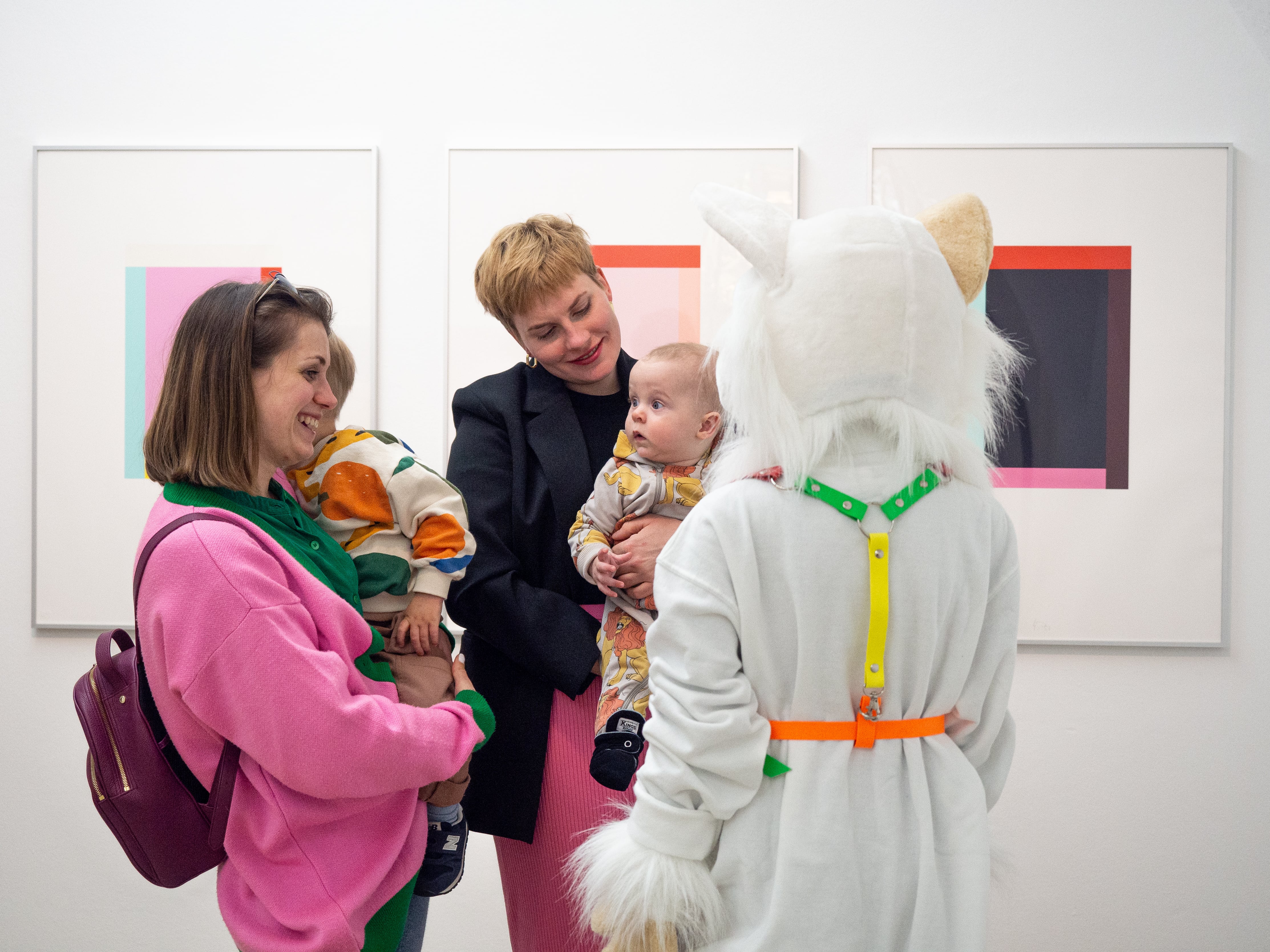 parents with children in the exhibition